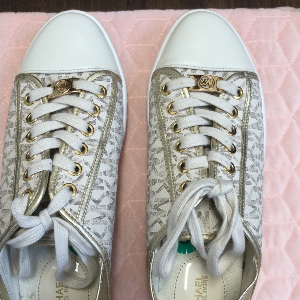 Michael Kor white and Gold sneakers size 8